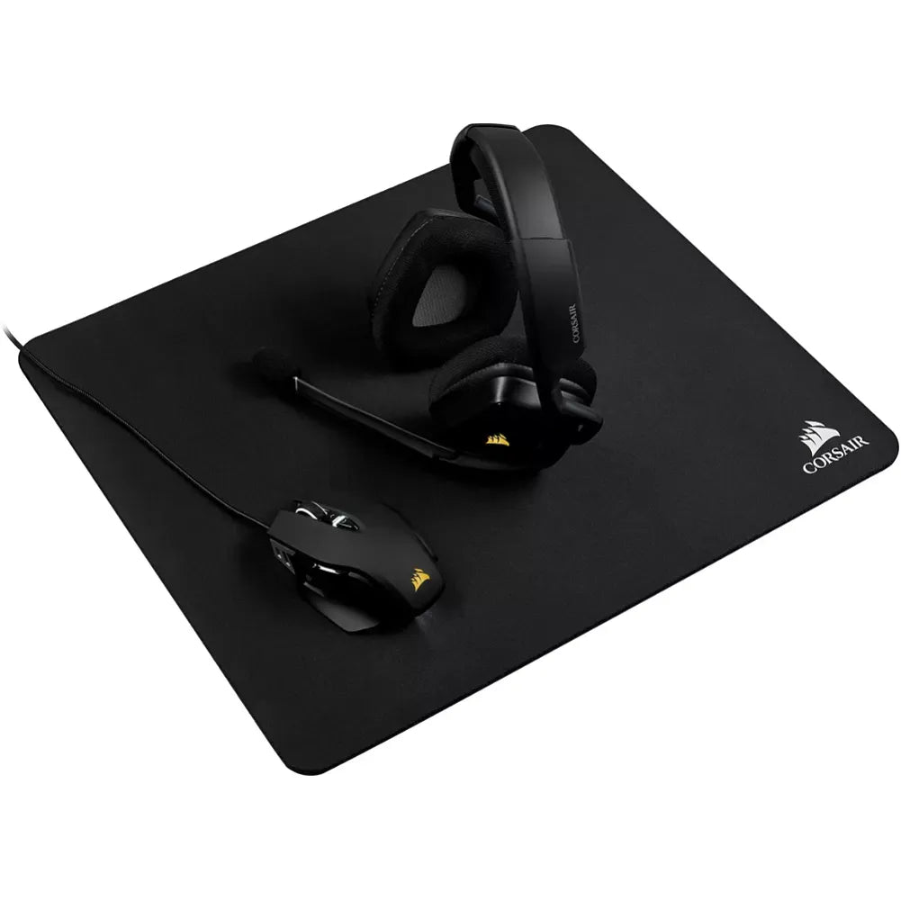 Corsair MM100 gaming mouse pad with a headset and mouse, offering precision control for gamers.