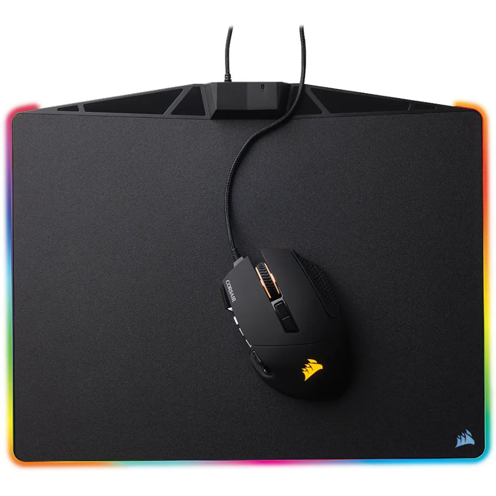 Corsair MM800 Polaris gaming mouse pad with RGB lighting and sleek design, featuring a gaming mouse on its surface.