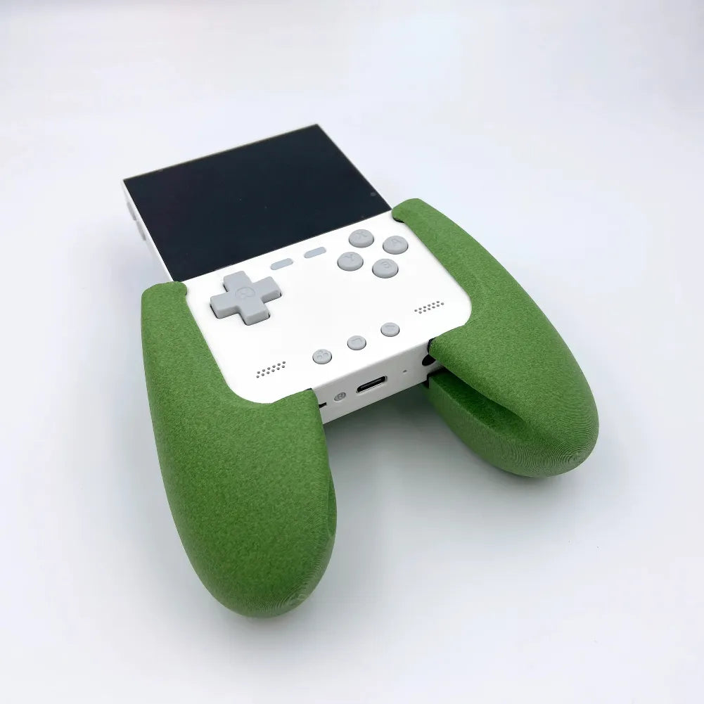 Grip Trimui Brick manette ergonomique avec mousse verte et revêtement anti-glisse pour confort de jeu.