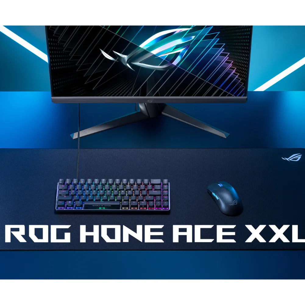Tapis de souris ROG Hone Ace XXL avec clavier RGB et souris, parfait pour les gamers.