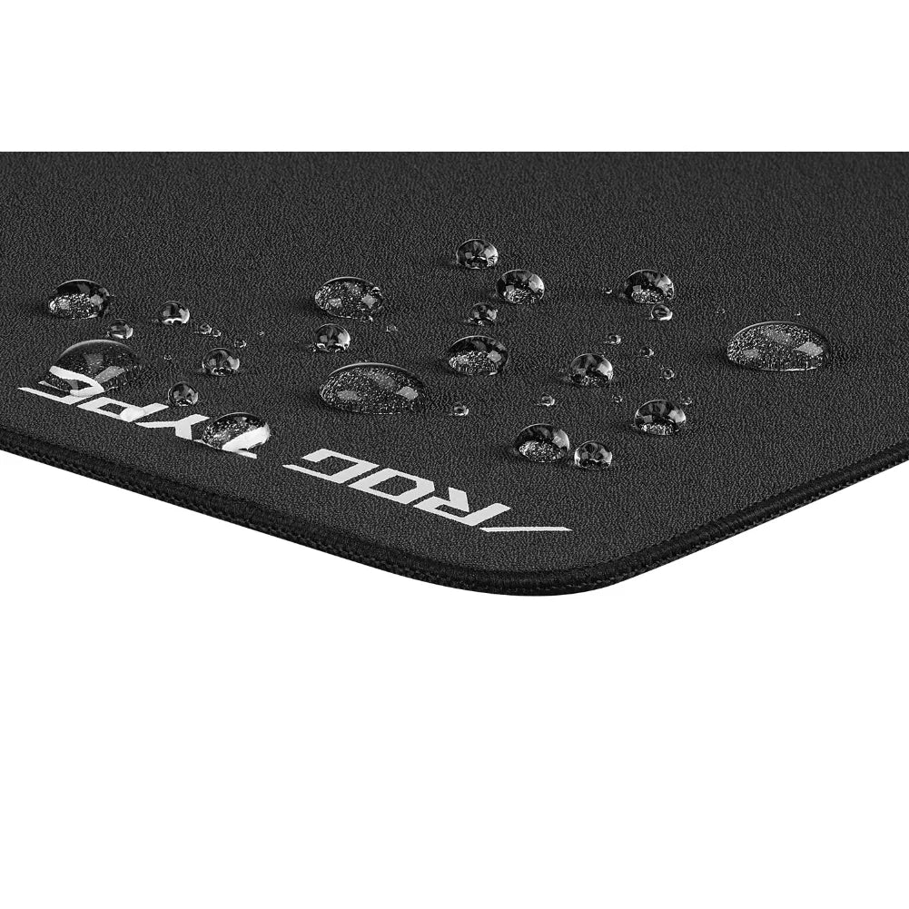 Close-up of ROG Hone Ace XXL mouse pad showcasing water-resistant nano-coating and durable edge.