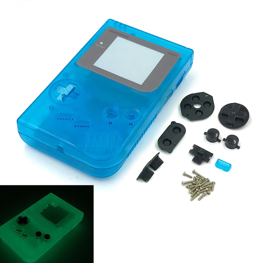 Coque complète Game Boy DMG bleu luminescent avec ses boutons, vis et pads, aperçu de la lueur dans le noir