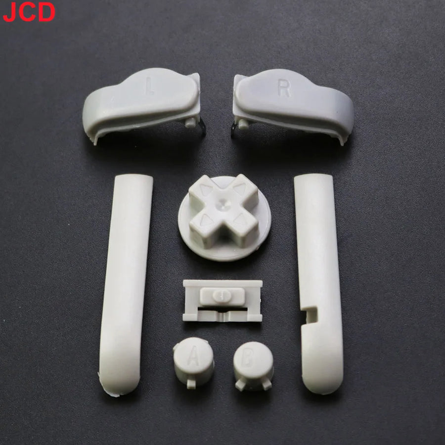 Jeu de boutons de remplacement pour Game Boy Advance : A/B, croix directionnelle et gâchettes L/R — Gris
