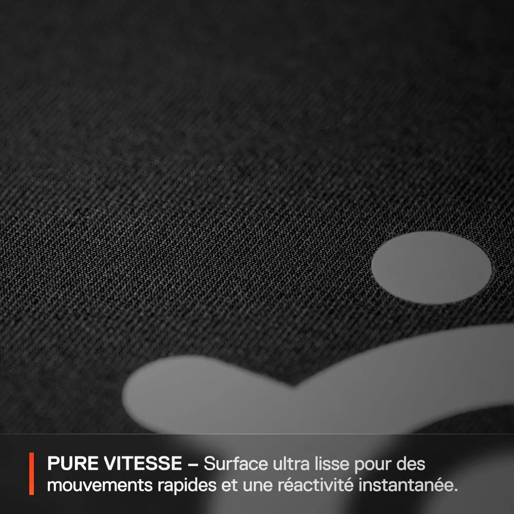 Close-up of SteelSeries QcK Performance Speed surface showcasing ultra-smooth texture for fast movements.