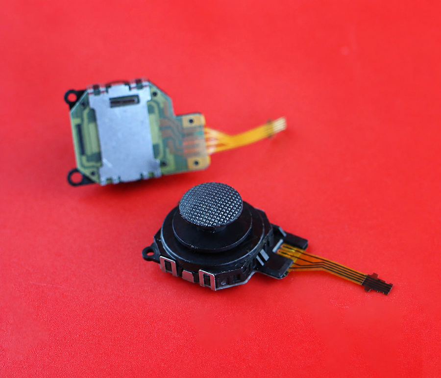 PSP 3000 analog stick, back of the module with metal shielding