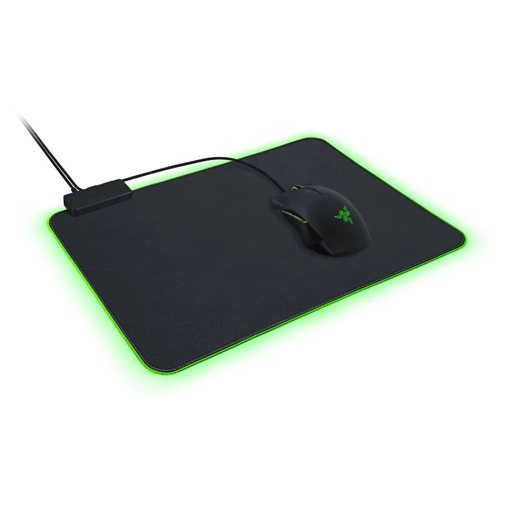 Razer Goliathus Chroma M RGB gaming mouse pad with a black surface and green lighting.