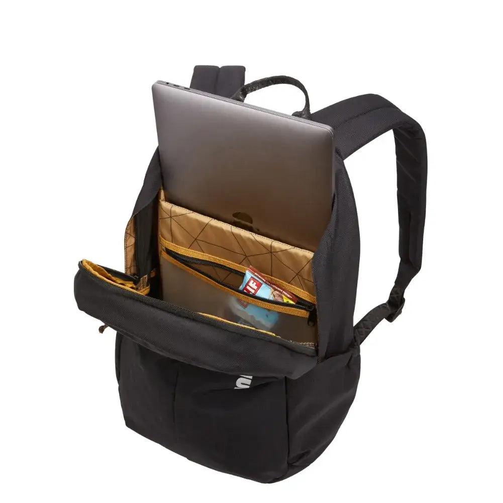 Poche avant du Thule Indago 23L avec accessoires visibles