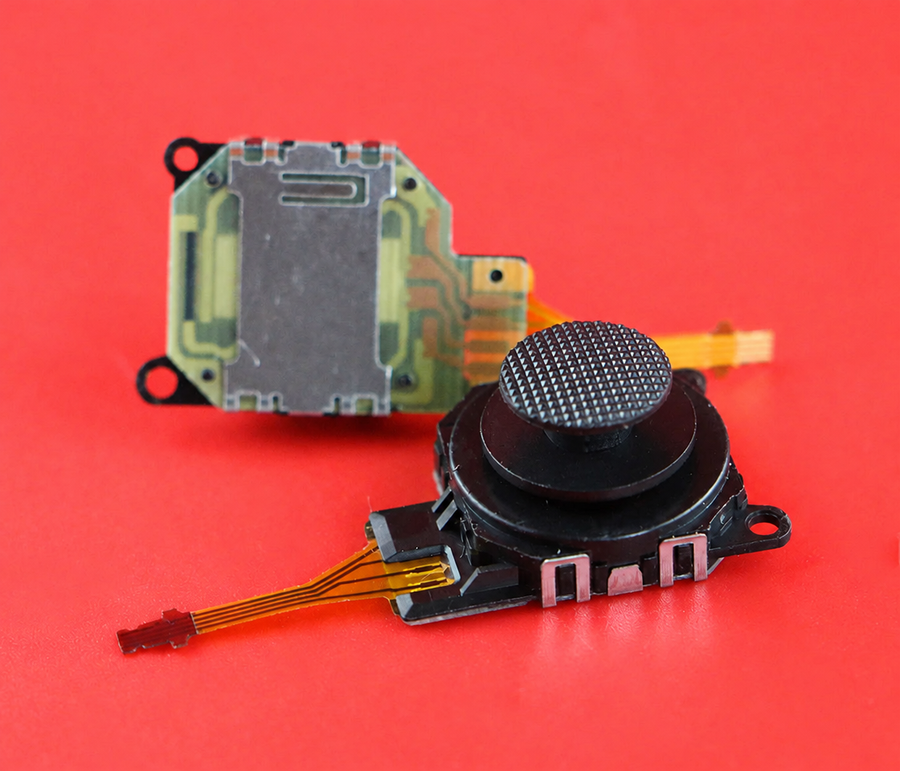 PSP 3000 analog stick, front and back view